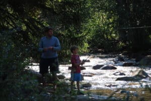 A.J. and dad trying to catch a whopper. by: Cori Kline